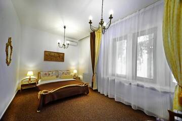 Фото номера Двухместный номер с 1 кроватью Гостевой дом Casa Negustorului г. Дева 37